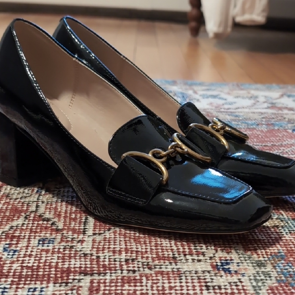 Chic Black Patent Leather Loafers with Gold Accents